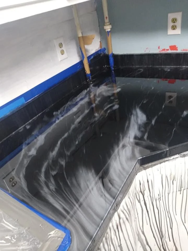 Dark patterned kitchen countertop with surrounding surfaces masked