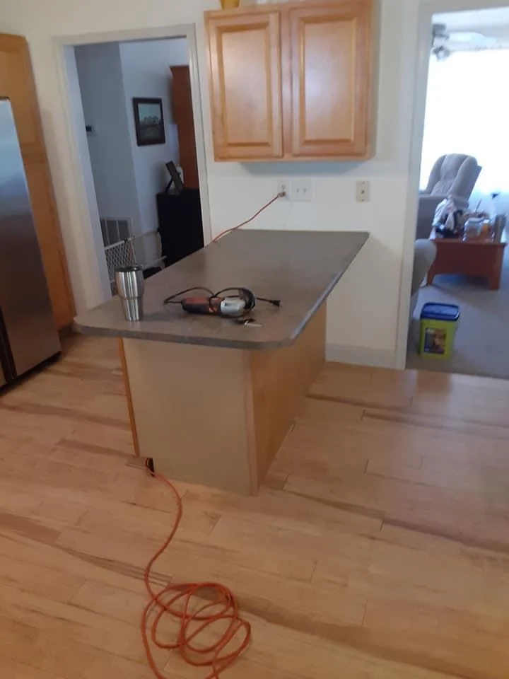 Kitchen peninsula countertop with tools nearby