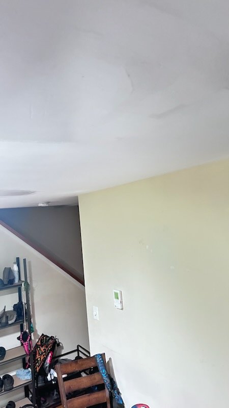 Ceiling surface at an interior wall